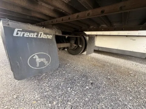 Great Dane branded mud flap showing manufacturer logo and undercarriage protection